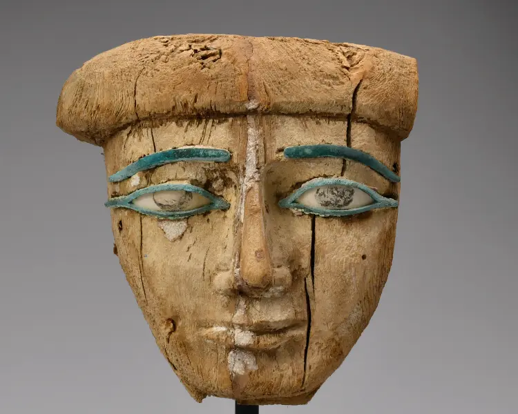 古代エジプト 木彫の面（棺の顔貌部・象嵌の眼が残る）— 木彫り・彫刻の買取例
