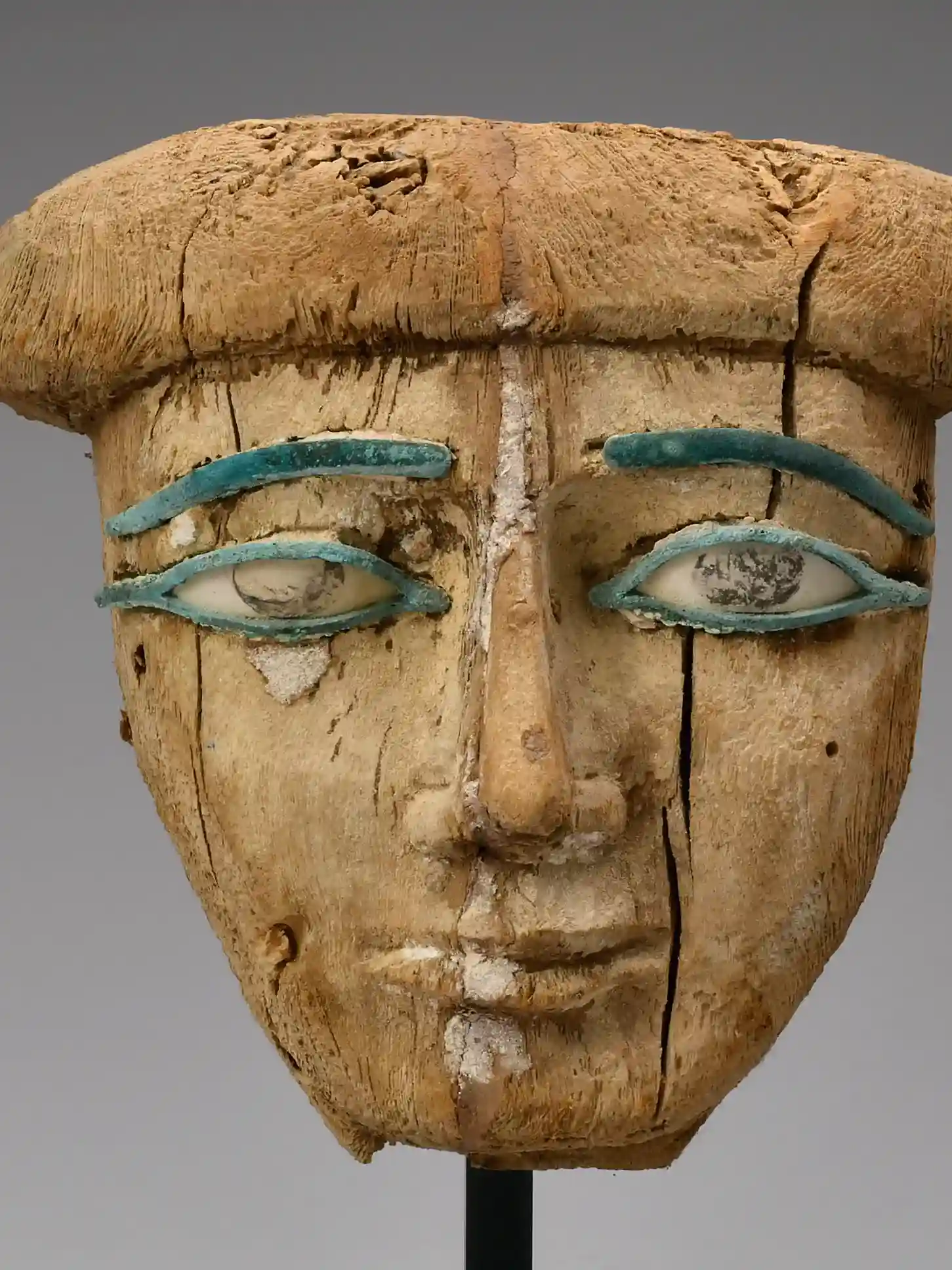 古代エジプト 木彫の面(棺の顔貌部・象嵌の眼が残る)——木彫り・彫刻の買取例